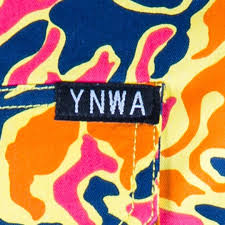 YNWA sewed onto the pocket o a TradeMutt shirt